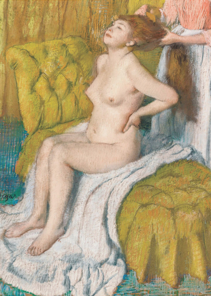 A pastel drawing by Edgar Degas of a nude woman with red hair sitting on a plush, chartreuse armchair. She leans her head back in pleasure as another person, likely a maid, stands behind her and combs her hair. The scene is intimate and rendered in an impressionistic style with visible pastel strokes. Artwork