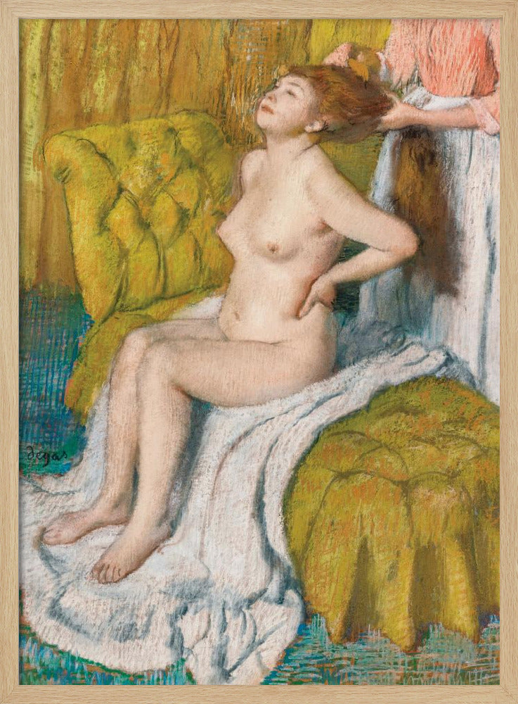 A pastel drawing by Edgar Degas of a nude woman with red hair sitting on a plush, chartreuse armchair. She leans her head back in pleasure as another person, likely a maid, stands behind her and combs her hair. The scene is intimate and rendered in an impressionistic style with visible pastel strokes. Artwork