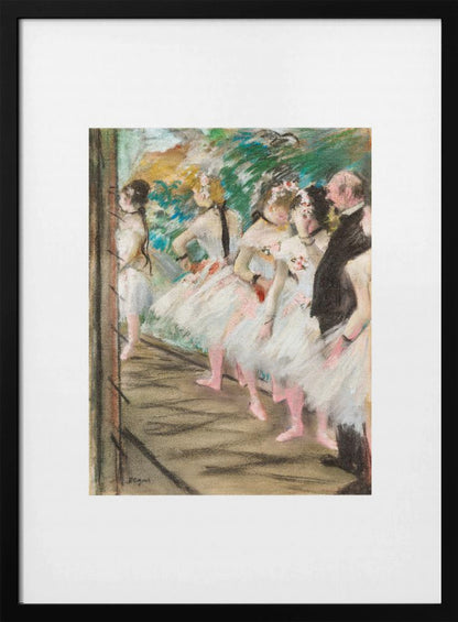 An Impressionist painting by Edgar Degas showing a group of ballet dancers in white tutus waiting in the wings of a stage. A man in a dark suit stands with them. The artwork is presented in a black frame with a white mat. Print