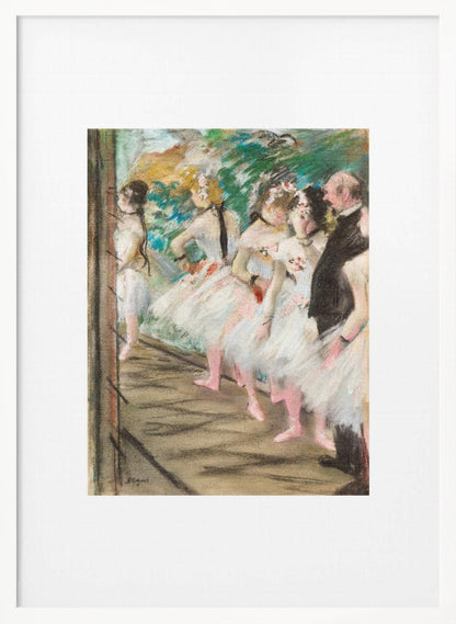 An Impressionist painting by Edgar Degas showing a group of ballet dancers in white tutus waiting in the wings of a stage. A man in a dark suit stands with them. The artwork is presented in a black frame with a white mat. Print
