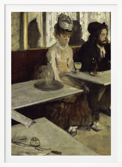 An impressionist painting by Edgar Degas, 'L'Absinthe', depicting a man and a woman sitting separately in a cafe. The woman in a light dress and hat looks downcast before a glass of pale green absinthe, while the bearded man next to her smokes a pipe and looks to the right. The scene is captured from an angle, with empty cafe tables in the foreground. Poster