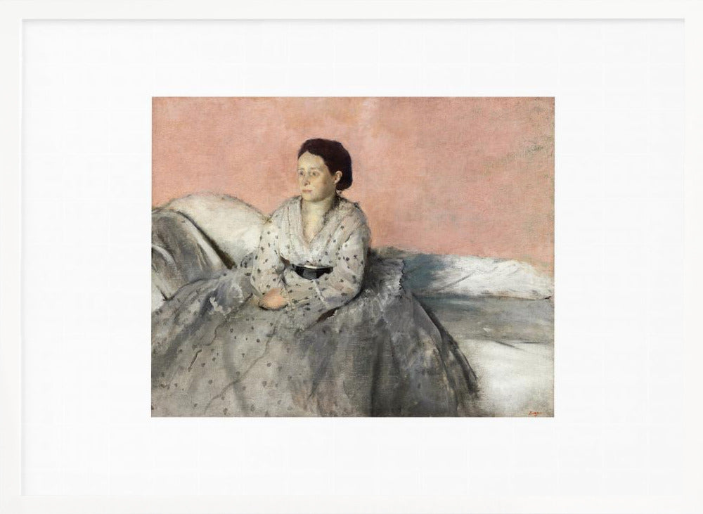 A framed impressionist painting of a woman with dark hair sitting on a bed against a dusty rose background. She wears a white, dotted blouse and a voluminous gray skirt, looking thoughtfully to her left. The painting is set in a silver frame with a white mat. Poster