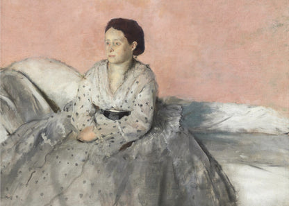 A framed impressionist painting titled 'Mélancolie' by Edgar Degas, depicting a woman with dark hair pulled back, seated on a couch or bed. She wears a white and grey polka-dotted dress with a black sash and has a pensive expression, looking off to the side against a soft pink background. Decor
