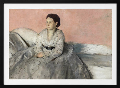 A framed impressionist painting titled 'Mélancolie' by Edgar Degas, depicting a woman with dark hair pulled back, seated on a couch or bed. She wears a white and grey polka-dotted dress with a black sash and has a pensive expression, looking off to the side against a soft pink background. Decor