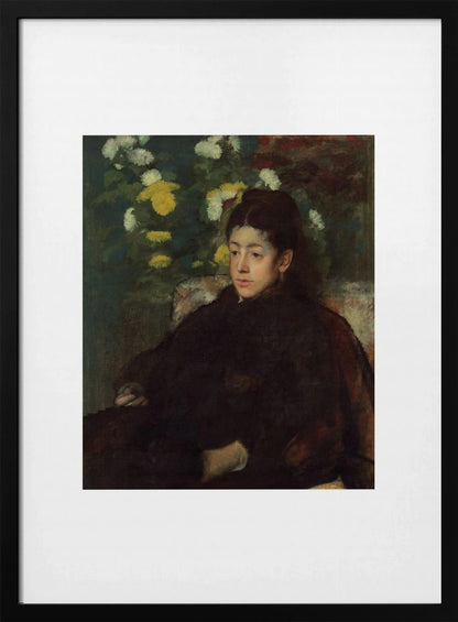 A framed impressionist portrait painting by Edgar Degas of a young woman with dark hair pulled back, wearing a voluminous dark dress. She sits in a chair with a pensive look, set against a background of yellow and white chrysanthemums and dark green foliage. Decor