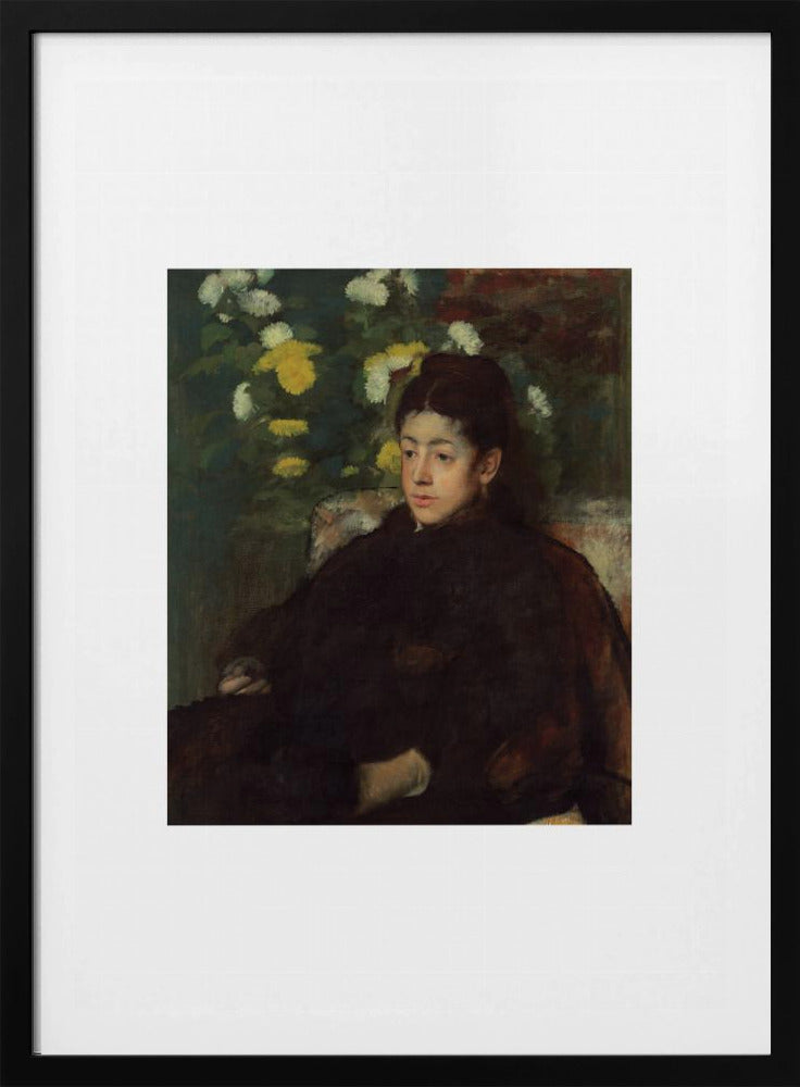 A framed impressionist portrait painting by Edgar Degas of a young woman with dark hair pulled back, wearing a voluminous dark dress. She sits in a chair with a pensive look, set against a background of yellow and white chrysanthemums and dark green foliage. Decor
