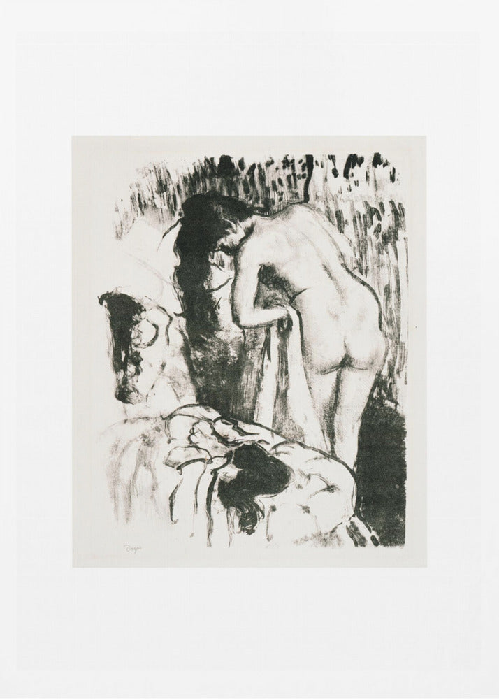 A framed black and white lithograph by Edgar Degas of a nude woman with long dark hair, viewed from the back as she leans over. The artwork has a sketchy, impressionistic style, capturing an intimate moment. Wall Art