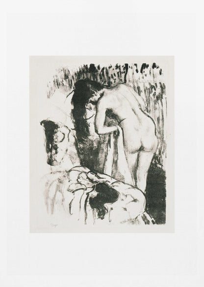 A framed black and white lithograph by Edgar Degas of a nude woman with long dark hair, viewed from the back as she leans over. The artwork has a sketchy, impressionistic style, capturing an intimate moment. Wall Art