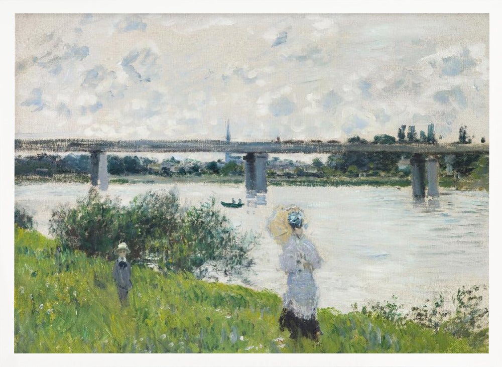 A scenic landscape art print by Claude Monet titled 'The Promenade With the Railroad Bridge, Argenteuil', depicting people on a promenade alongside a body of water with a railroad bridge in the background, characteristic of Impressionist style with soft colors and brushstrokes. Print