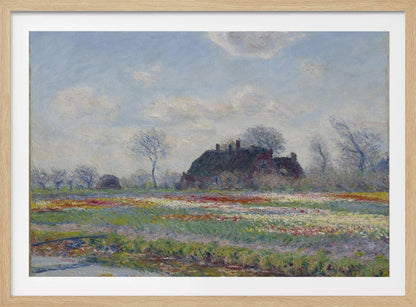 An Impressionist painting of a Dutch landscape featuring a field of colorful tulips in the foreground and a traditional farmhouse with a thatched roof in the background, under a cloudy blue sky. The artwork is displayed in a silver frame. Poster