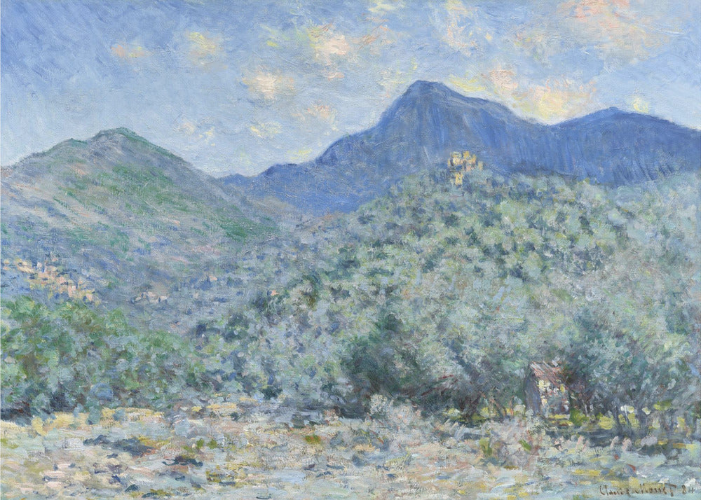 An Impressionist painting by Claude Monet, 'Valle Buona, near Bordighera', showcasing a vast landscape of rolling green hills and deep blue mountains under a light blue sky with wispy clouds. The painting, rendered in soft, textured brushstrokes, is presented in a simple silver frame. Print