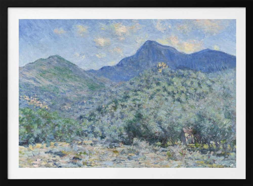 An Impressionist painting by Claude Monet, 'Valle Buona, near Bordighera', showcasing a vast landscape of rolling green hills and deep blue mountains under a light blue sky with wispy clouds. The painting, rendered in soft, textured brushstrokes, is presented in a simple silver frame. Print