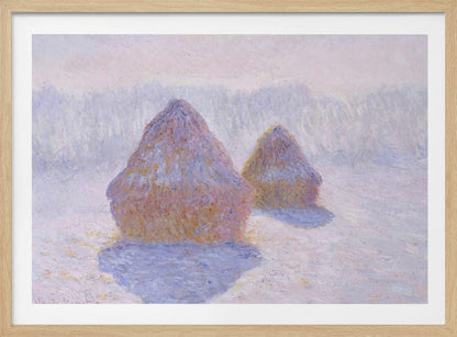 An impressionist painting by Claude Monet titled 'Haystacks,' showing two large, conical haystacks in a snowy field. The scene is bathed in a soft, hazy light, with pinks and oranges on the sunlit side of the haystacks and long, purple shadows cast across the lavender and white snow. The artwork is presented in a simple silver frame. Wall Art