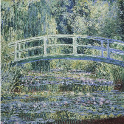 An Impressionist painting by Claude Monet, 'The Water Lily Pond', in a light wood frame. A pale green Japanese footbridge arches over a tranquil pond filled with pink and white water lilies, reflecting the lush green and blue foliage of weeping willows that surround it. Poster