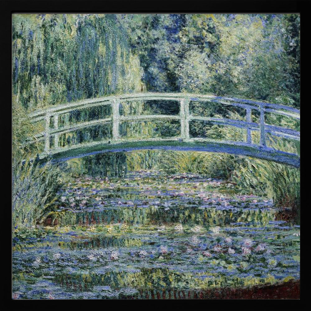 An Impressionist painting by Claude Monet, 'The Water Lily Pond', in a light wood frame. A pale green Japanese footbridge arches over a tranquil pond filled with pink and white water lilies, reflecting the lush green and blue foliage of weeping willows that surround it. Poster