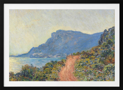 An Impressionist painting by Claude Monet titled 'Cap Martin, near Menton', depicting a sunlit coastal scene. A reddish-brown path winds along a vibrant, brush-covered cliff in the foreground, overlooking the blue Mediterranean Sea. A large, hazy blue mountain dominates the background under a pale yellow sky. Decor
