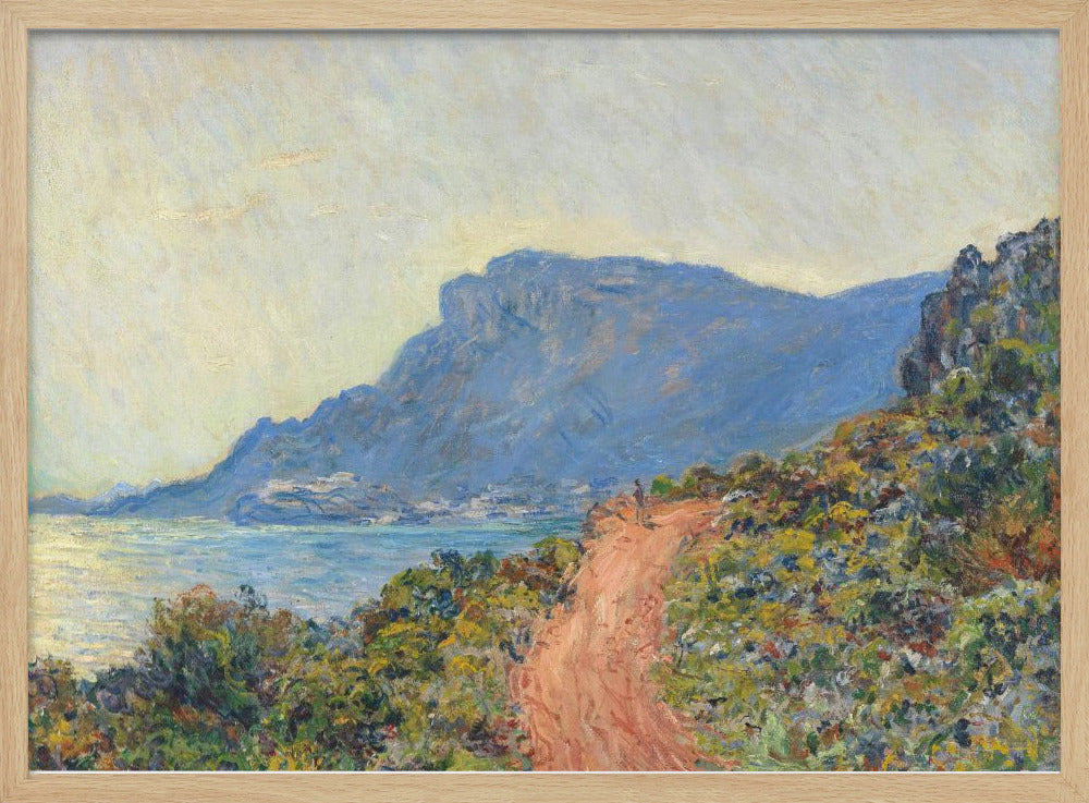 An Impressionist painting by Claude Monet titled 'Cap Martin, near Menton', depicting a sunlit coastal scene. A reddish-brown path winds along a vibrant, brush-covered cliff in the foreground, overlooking the blue Mediterranean Sea. A large, hazy blue mountain dominates the background under a pale yellow sky. Decor