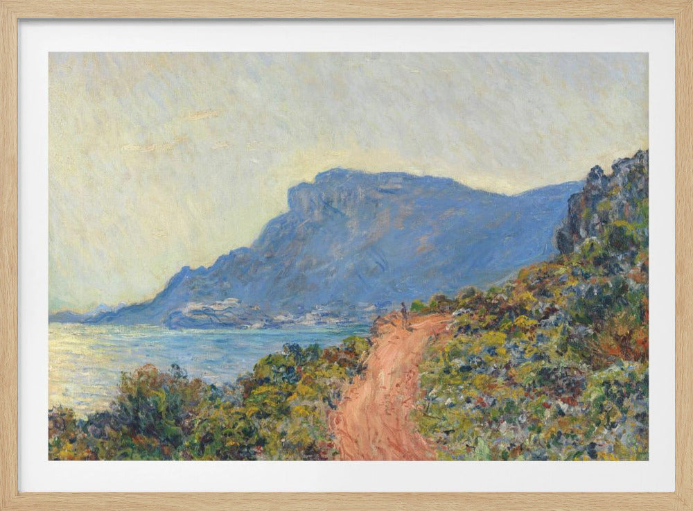 An Impressionist painting by Claude Monet titled 'Cap Martin, near Menton', depicting a sunlit coastal scene. A reddish-brown path winds along a vibrant, brush-covered cliff in the foreground, overlooking the blue Mediterranean Sea. A large, hazy blue mountain dominates the background under a pale yellow sky. Decor