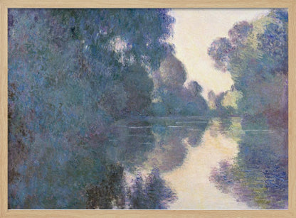 An Impressionist painting in a silver frame depicting a hazy river scene. Lush trees in shades of blue and purple line the banks, their forms and a patch of pale yellow sky softly reflected in the calm water. Artwork