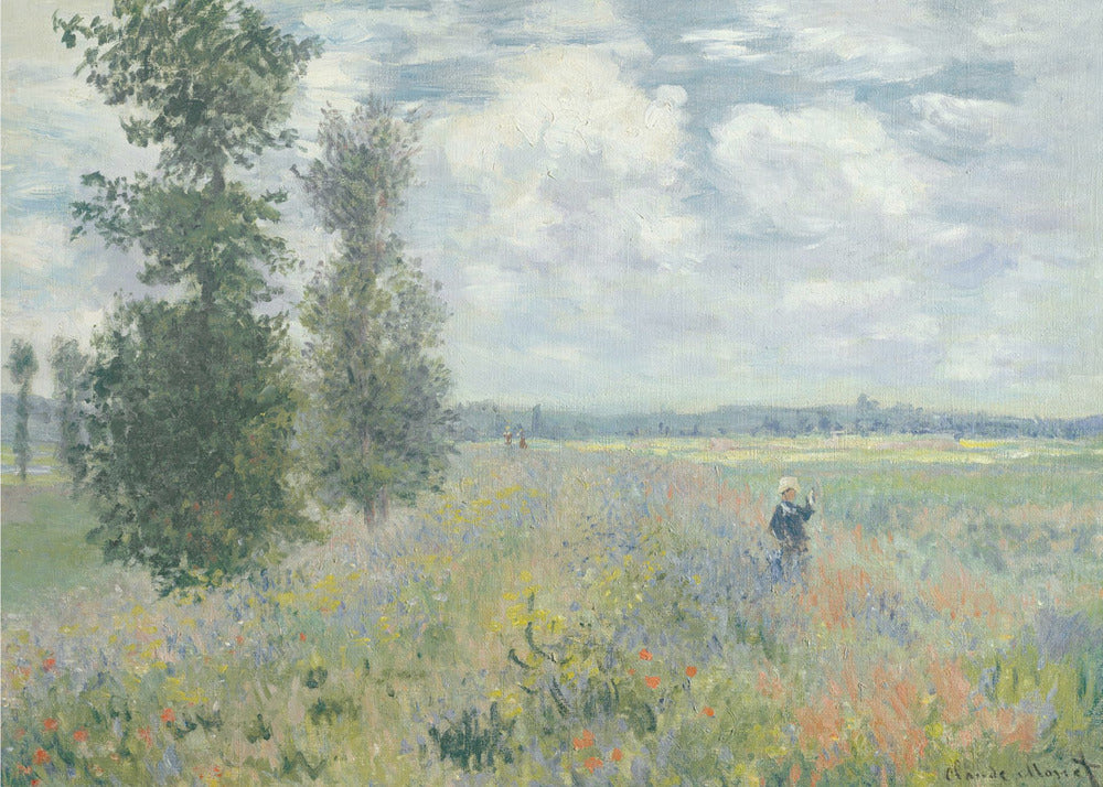 An impressionist painting by Claude Monet titled 'Poppy Field near Vétheuil', depicting a vast field of green grass dotted with red, yellow, and purple wildflowers. A figure in a white bonnet stands in the field to the right. Tall green trees are on the left, under a blue sky with fluffy white clouds. The entire scene is presented within a modern silver frame. Wall Art