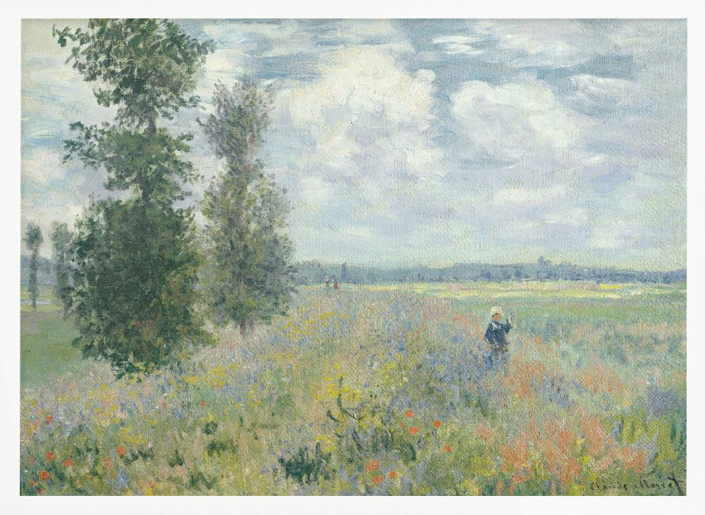 An impressionist painting by Claude Monet titled 'Poppy Field near Vétheuil', depicting a vast field of green grass dotted with red, yellow, and purple wildflowers. A figure in a white bonnet stands in the field to the right. Tall green trees are on the left, under a blue sky with fluffy white clouds. The entire scene is presented within a modern silver frame. Wall Art