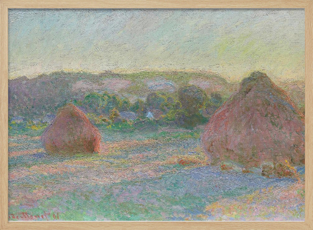 An Impressionist painting by Claude Monet depicting two large, reddish haystacks in a field of green and purple hues during sunrise, with a line of distant trees under a pale yellow sky, all within a silver frame. Poster