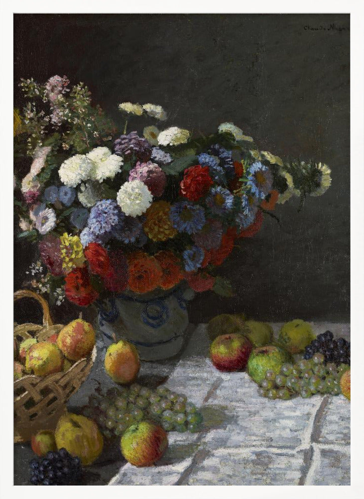 A classic still life painting by Claude Monet depicting a vibrant, multicolored bouquet of flowers in a ceramic vase. Scattered around the vase on a white tablecloth are various fruits, including apples, pears in a basket, and bunches of grapes, all set against a dark, moody background. Poster