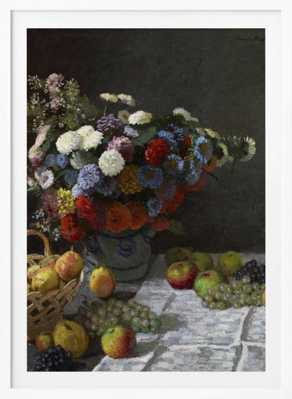 A classic still life painting by Claude Monet depicting a vibrant, multicolored bouquet of flowers in a ceramic vase. Scattered around the vase on a white tablecloth are various fruits, including apples, pears in a basket, and bunches of grapes, all set against a dark, moody background. Poster