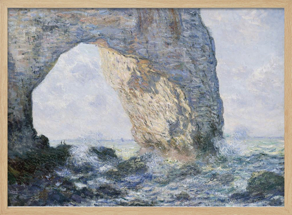An impressionist painting by Claude Monet of the Manneporte rock arch at Étretat, France. Sunlight illuminates the massive stone arch as turbulent blue and white waves crash against the rocky shoreline below. The artwork is displayed in a silver frame. Decor