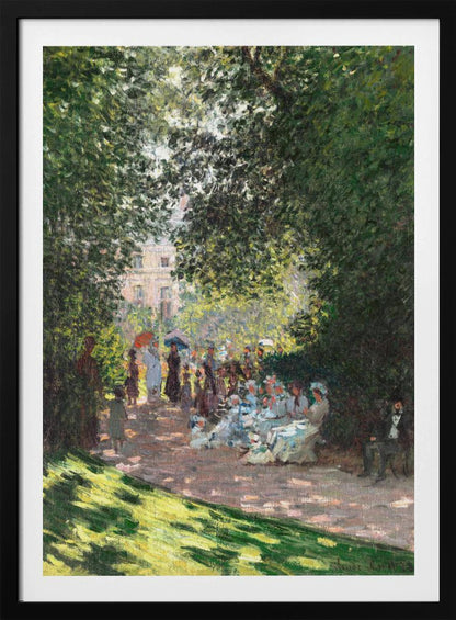 An Impressionist painting of a group of people having a luncheon in a park on a sunny day. Sunlight filters through the dense green leaves of overhead trees, creating a dappled light effect on the figures and the ground. In the background, more people stroll along a path, and a building is visible through the trees. Wall Art