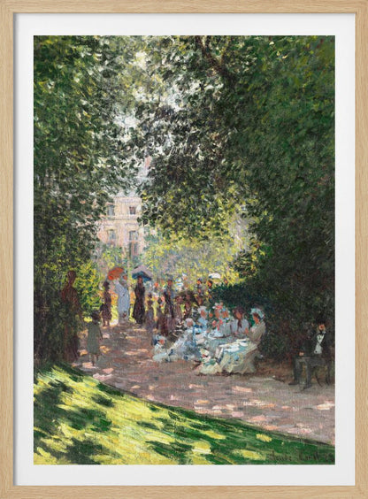 An Impressionist painting of a group of people having a luncheon in a park on a sunny day. Sunlight filters through the dense green leaves of overhead trees, creating a dappled light effect on the figures and the ground. In the background, more people stroll along a path, and a building is visible through the trees. Wall Art