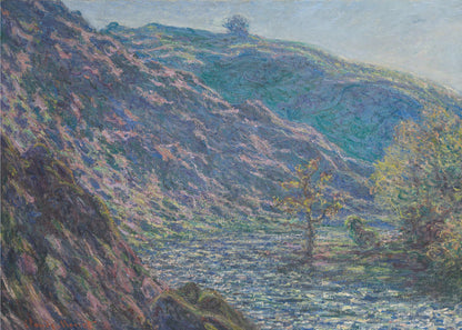 A framed Impressionist painting depicting a river valley. A steep hillside with purple and blue tones dominates the left, while a sun-dappled river flows below. In the distance, gentle green and blue hills rise against a pale sky. Artwork