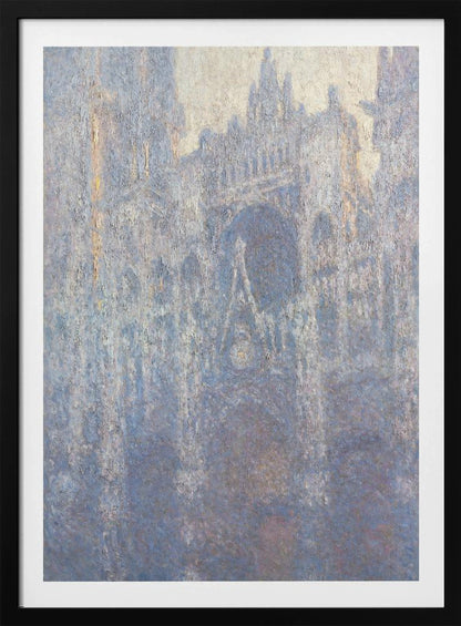 An Impressionist painting by Claude Monet depicting the Rouen Cathedral. The view is a close-up of the facade, rendered in hazy, textured brushstrokes with a predominantly blue, gray, and pale yellow color palette, suggesting early morning light or fog. The painting is enclosed in a simple black frame. Artwork