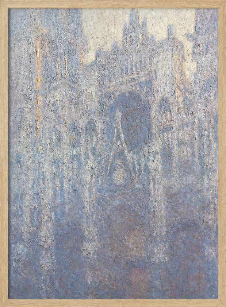An Impressionist painting by Claude Monet depicting the Rouen Cathedral. The view is a close-up of the facade, rendered in hazy, textured brushstrokes with a predominantly blue, gray, and pale yellow color palette, suggesting early morning light or fog. The painting is enclosed in a simple black frame. Artwork