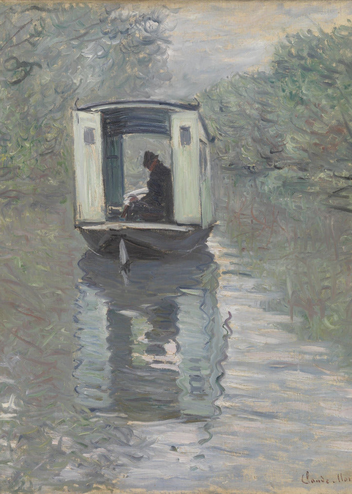 An Impressionist painting by Claude Monet titled 'The Studio Boat,' depicting a figure in a hat and dark coat sitting inside a small, white-paneled boat on a calm, grey-green river. The scene is enveloped in a soft, hazy light, with blurry trees lining the banks and a strong, rippling reflection of the boat in the water. Artwork