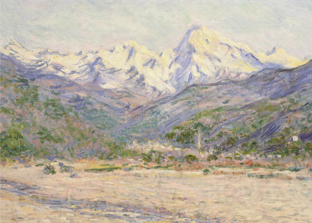 An impressionistic painting of a vast mountain range. The snow-covered peaks are bathed in pale yellow sunlight, while the lower slopes are cast in shades of purple and blue. A wide, beige valley with patches of green foliage sits in the foreground, all rendered with visible, textured brushstrokes and displayed in a silver frame. Print