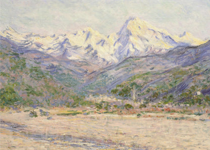 An impressionistic painting of a vast mountain range. The snow-covered peaks are bathed in pale yellow sunlight, while the lower slopes are cast in shades of purple and blue. A wide, beige valley with patches of green foliage sits in the foreground, all rendered with visible, textured brushstrokes and displayed in a silver frame. Print