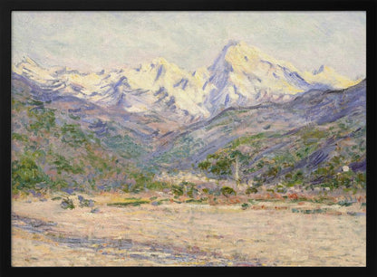 An impressionistic painting of a vast mountain range. The snow-covered peaks are bathed in pale yellow sunlight, while the lower slopes are cast in shades of purple and blue. A wide, beige valley with patches of green foliage sits in the foreground, all rendered with visible, textured brushstrokes and displayed in a silver frame. Print