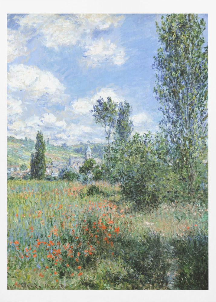 An impressionist painting depicting a vibrant green field filled with red poppies under a bright blue sky with fluffy white clouds. Tall green trees stand on the right, and in the distance, a small village with a church steeple is nestled in the rolling hills. Decor