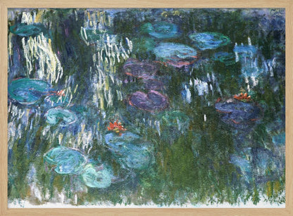 An impressionist painting by Claude Monet of his water lily pond. The canvas is filled with cool tones of green, blue, and purple depicting the water and lily pads. Short, vertical brushstrokes of white and yellow suggest the reflection of light on the water's surface, while small dabs of orange indicate blooming flowers. The entire painting is enclosed in a modern silver frame. Artwork