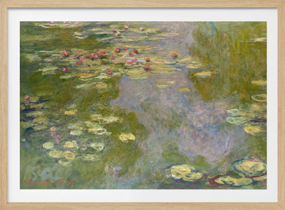 An impressionist painting of a water lily pond by Monet, featuring pink and red water lilies floating amongst green pads on the water's surface, which reflects the surrounding greenery and sky in shades of green, blue, and violet. The painting is displayed in a modern silver frame. Wall Art