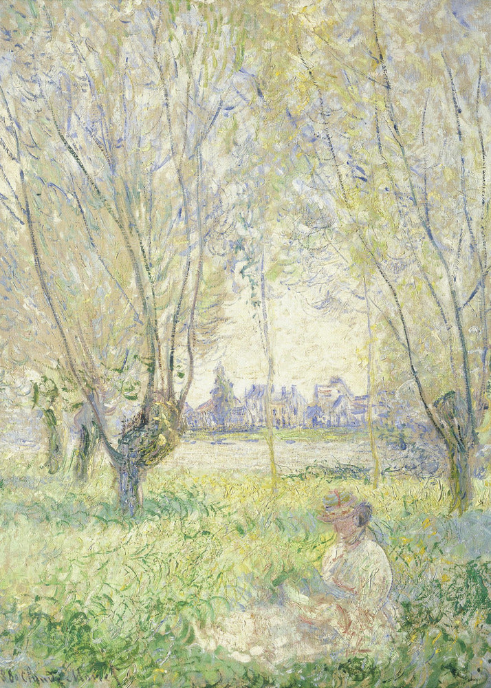 An Impressionist painting, 'Springtime' by Claude Monet, showing a woman in a hat sitting in a sunlit green field. Slender trees with light green foliage frame a view of a village across a river, evoking a peaceful spring day. The artwork is presented in a simple black frame. Artwork