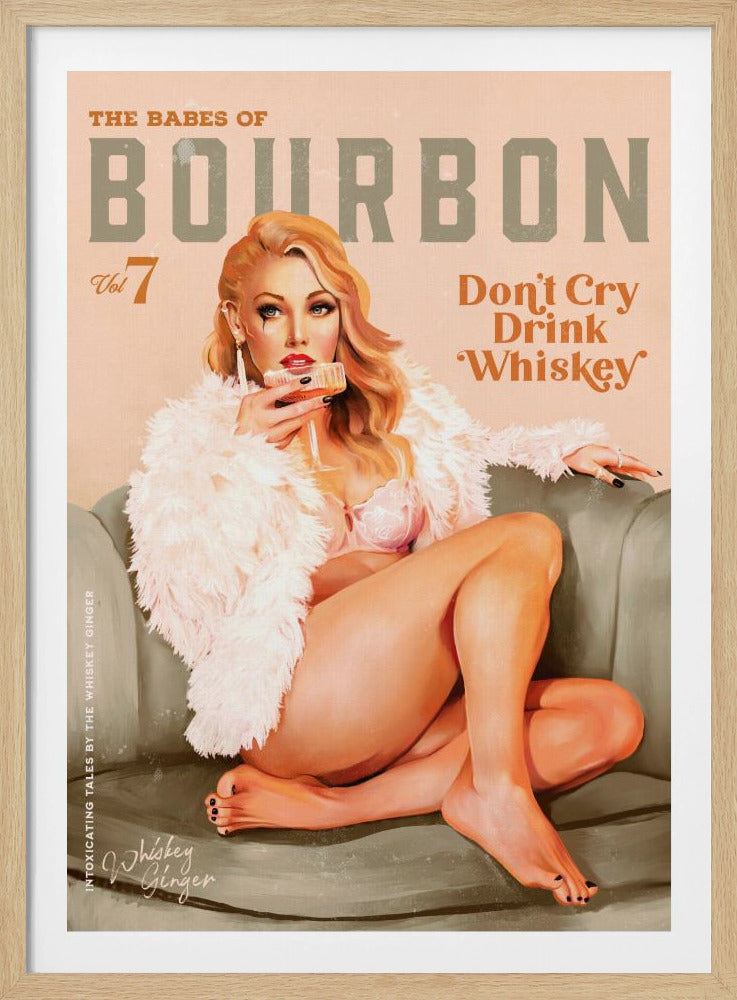 A vintage-style pin-up poster titled 'The Babes of Bourbon, Vol 7'. A glamorous blonde woman in a pink bra and fluffy white coat lounges on a gray-green sofa, holding a glass of whiskey. The poster also has the text 'Don't Cry Drink Whiskey'. Wall Art
