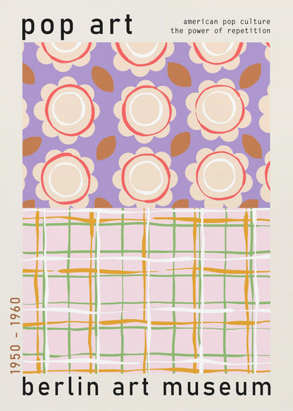 A framed pop art museum poster advertising an exhibition at the Berlin Art Museum. The poster features two distinct patterns. The top section has repeating stylized cream and red flowers on a purple background, with the words 'pop art' and 'american pop culture the power of repetition'. The bottom section displays a pink, green, and orange plaid pattern. The dates '1950 - 1960' are printed vertically on the side. Artwork