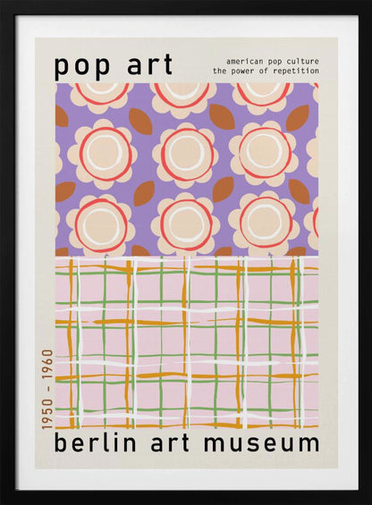 A framed pop art museum poster advertising an exhibition at the Berlin Art Museum. The poster features two distinct patterns. The top section has repeating stylized cream and red flowers on a purple background, with the words 'pop art' and 'american pop culture the power of repetition'. The bottom section displays a pink, green, and orange plaid pattern. The dates '1950 - 1960' are printed vertically on the side. Artwork