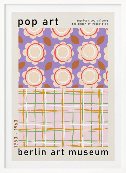 A framed pop art museum poster advertising an exhibition at the Berlin Art Museum. The poster features two distinct patterns. The top section has repeating stylized cream and red flowers on a purple background, with the words 'pop art' and 'american pop culture the power of repetition'. The bottom section displays a pink, green, and orange plaid pattern. The dates '1950 - 1960' are printed vertically on the side. Artwork