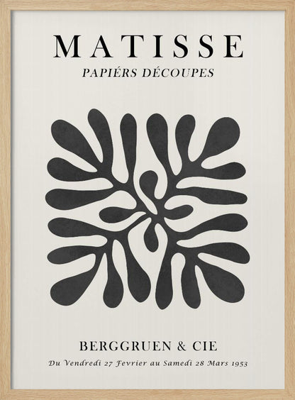A framed black and white exhibition poster for Matisse's 'Papiers Découpés' at Berggruen & Cie in 1953. The poster features a central abstract black cutout shape resembling a sea plant on an off-white background with black serif typography. Poster