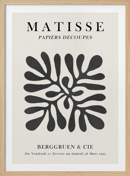 A framed black and white exhibition poster for Matisse's 'Papiers Découpés' at Berggruen & Cie in 1953. The poster features a central abstract black cutout shape resembling a sea plant on an off-white background with black serif typography. Poster