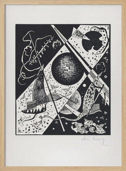 A framed black and white abstract woodcut print by Wassily Kandinsky. The dynamic composition features a mix of geometric shapes like circles and triangles, intersected by strong diagonal lines. Various textures and patterns fill the space, creating a sense of depth and movement. The artist's signature is visible in pencil on the white mat in the bottom right corner. Print