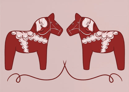 A symmetrical illustration of two red Swedish Dala horses facing each other against a light pink background. The horses are decorated with intricate white and pink folk art patterns. The artwork is presented within a silver frame. Artwork